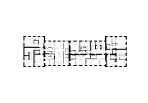 Black and white architectural line drawing of a building floor plan.