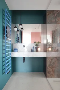 Modern bathroom with a countertop made of marble.