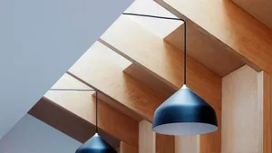 Modern entryway featuring wooden lighting fixtures