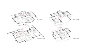 Floor plan of a residential building with multiple levels and designated areas.