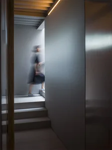 A minimalist staircase made of concrete material