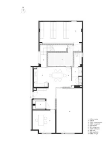 一間現代住宅平面圖，展示客廳內舒適的咖啡桌以及餐廳區域。