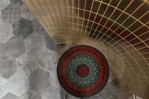 A tiled floor featuring a modern, minimalist design with a vintage-inspired pattern, including hexagonal tiles.