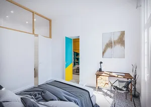 A modern bedroom with white walls, a grey bed, blue and yellow accents, and abstract art on the wall.
