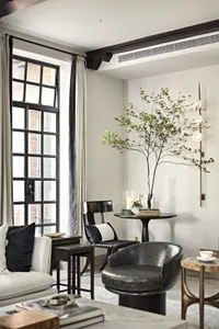 A modern lounge featuring patterned flooring and decorative stars.