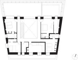 Black and white floor plan of a residential house, showing layout and rooms.