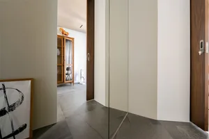 Modern minimalist living space with clean lines and light colors.
