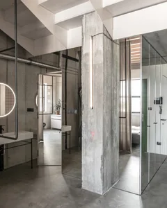 Modern industrial office space featuring concrete and glass materials