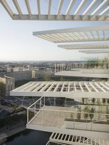A modern architectural design featuring terraced gardens constructed with metal and glass materials.