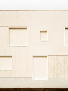 Modern building exterior with concrete facade and minimalistic design