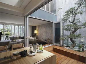 A modern minimalist living room featuring glass, wood, and stone elements.
