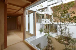 A modern residential architecture featuring wood elements.