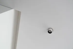 White ceiling with minimalist lighting fixture