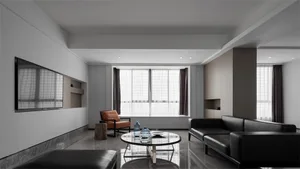 Modern living room with a mix of materials including glass, wood, and metal.