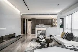 Modern living room with white and gray furniture, marble floor, and minimalist decor.