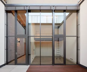 Modern office space with glass walls and open plan design