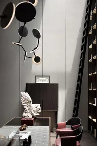 Modern office space with a combination of wooden furniture, glass elements, and leather chairs, featuring a contemporary ligh