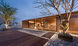 Modern residential space featuring wood materials and contemporary design elements.