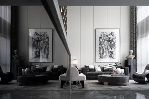 Modern living room featuring black leather sofas, glass coffee tables, and metal accents.