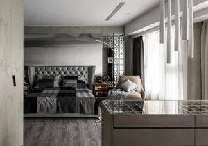 A modern minimalist bedroom featuring a faux leather bed frame and marble accents.