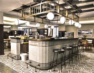 Industrial-style coffee shop with granite countertop and stools