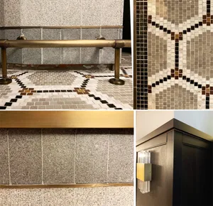 Glass mosaic tiles arranged in a geometric pattern on a flooring surface.