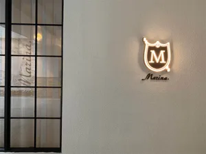 Modern Marina logo with illuminated light design