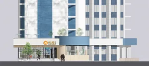 Modern commercial interior featuring glass, concrete, and wood elements