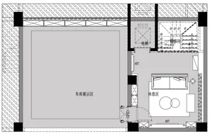 Floor plan of an industrial-style art exhibition center showcasing mixed materials and an elevator.