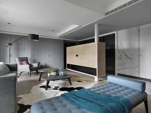 A stylish, minimalist living room with wooden furniture, modern decor, and a comfortable seating area.