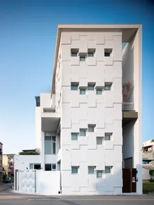 A modern building made primarily of concrete materials.