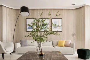 Modern living room featuring wood-paneled walls and a comfortable seating area.