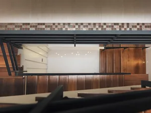 An office space featuring modern design with black steel materials.