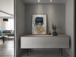 Modern minimalist living room with white furniture and decorative accents.