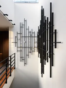 A modern interior with black metal decor and white walls.
