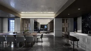 Modern living, dining, and kitchen area with marble countertops, concrete floor, and minimalist design.