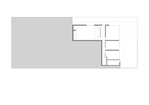 A modern minimalist architectural floor plan featuring clean lines and open spaces.