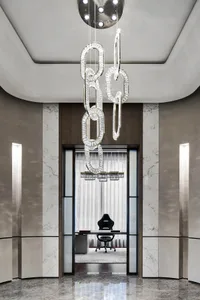 A modern executive office featuring marble finishes and elegant lighting fixtures.