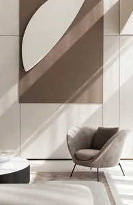 Modern minimalist living room with neutral tones, featuring a sleek armchair and a round coffee table in a contemporary apart