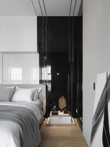 Minimalist bedroom with wood floor, glass walls, and metallic furniture.