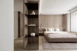 Minimalist bedroom featuring a wooden bed frame and shelves.