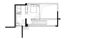 Minimalist residential floor plan featuring modern design elements like concrete and glass.