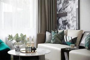 Modern living room with contemporary furniture and decorative elements.
