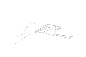 A line drawing of an industrial building with a metal exterior.