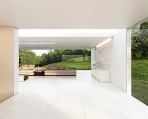 Modern minimalist residential interior featuring large glass windows and open-plan layout.