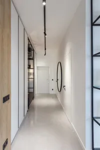 Modern concrete bedroom showcasing minimalist design elements and simple color palette