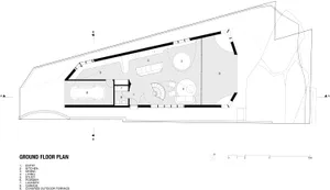 Detailed architectural drawing representing the ground floor plan of a house showing rooms, spaces, and layout.