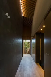 Modern corridor with concrete and wooden elements