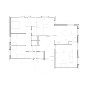 A black and white architectural drawing of a modern living room layout, showing furniture placement and room dimensions.
