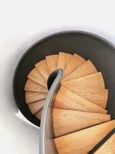 A modern circle staircase with wooden steps and metal railings.